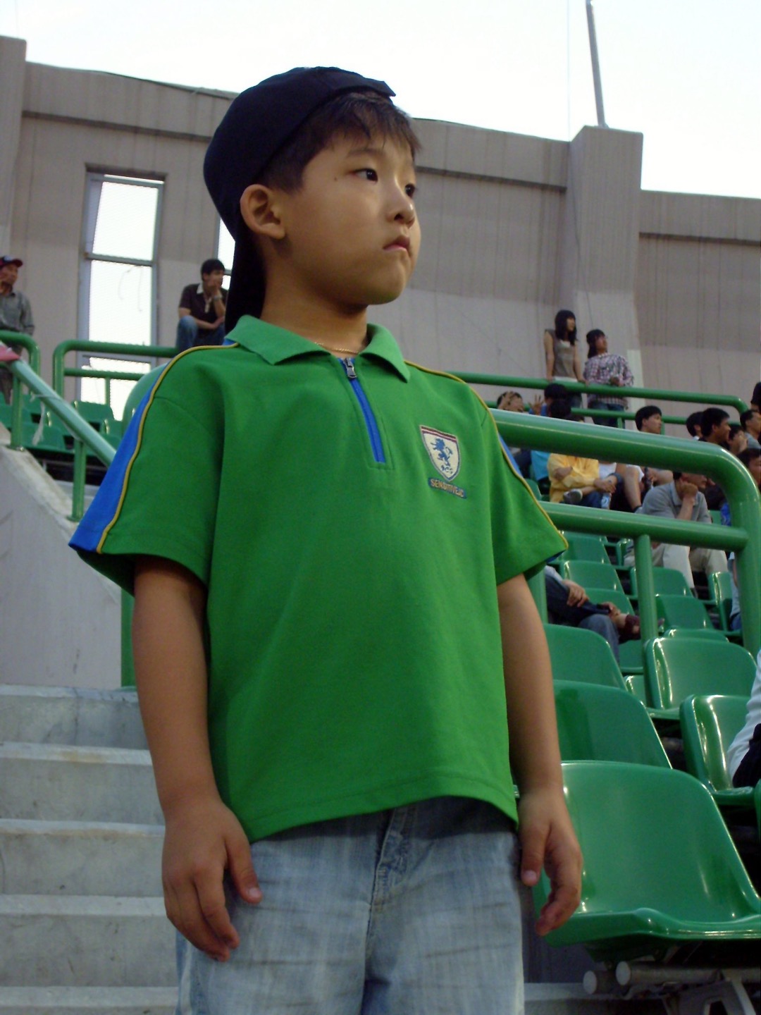At a baseball stadium as a child